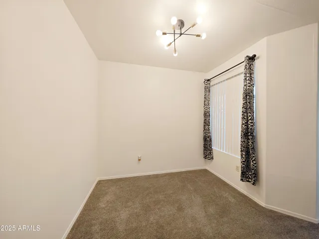 a view of a room with rack on the wall