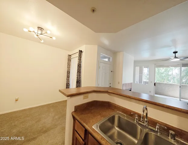a bathroom with a sink and a large mirror