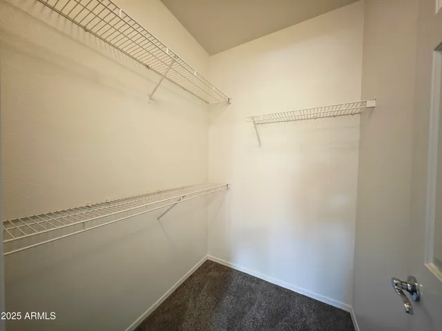 a view of small space with racks on the wall