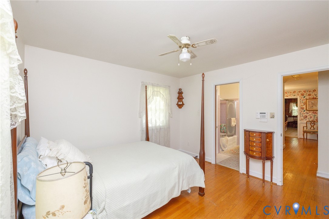 7035 Conifer Road Richmond, VA 23237 - Photo 13 of 38 Bedroom with light wood-style flooring, a ceiling