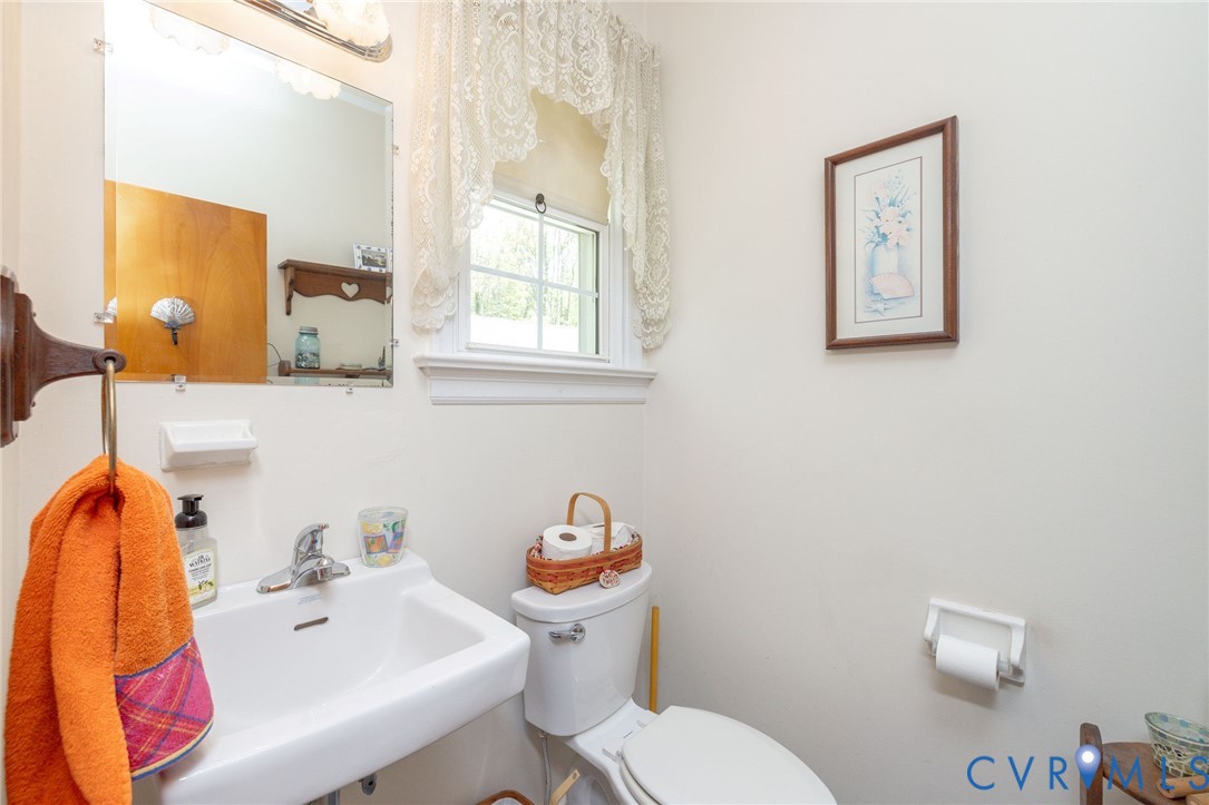 7035 Conifer Road Richmond, VA 23237 - Photo 19 of 38 Bathroom with toilet and a sink