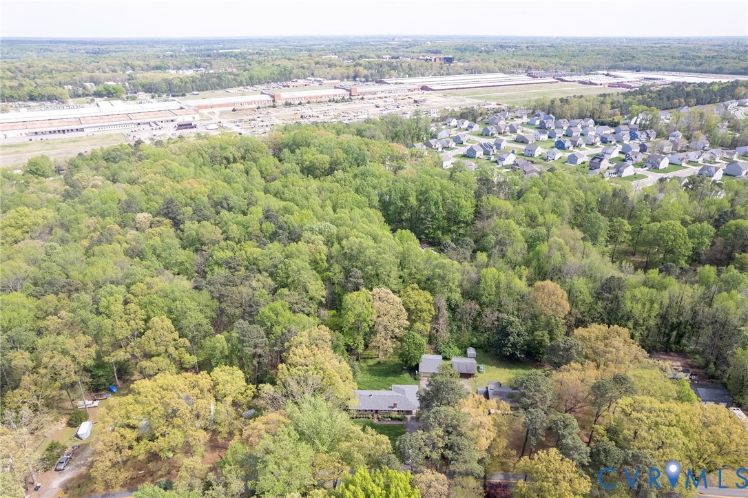 7035 Conifer Road Richmond, VA 23237 - Photo 7 of 38 Aerial view of a heavily wooded area