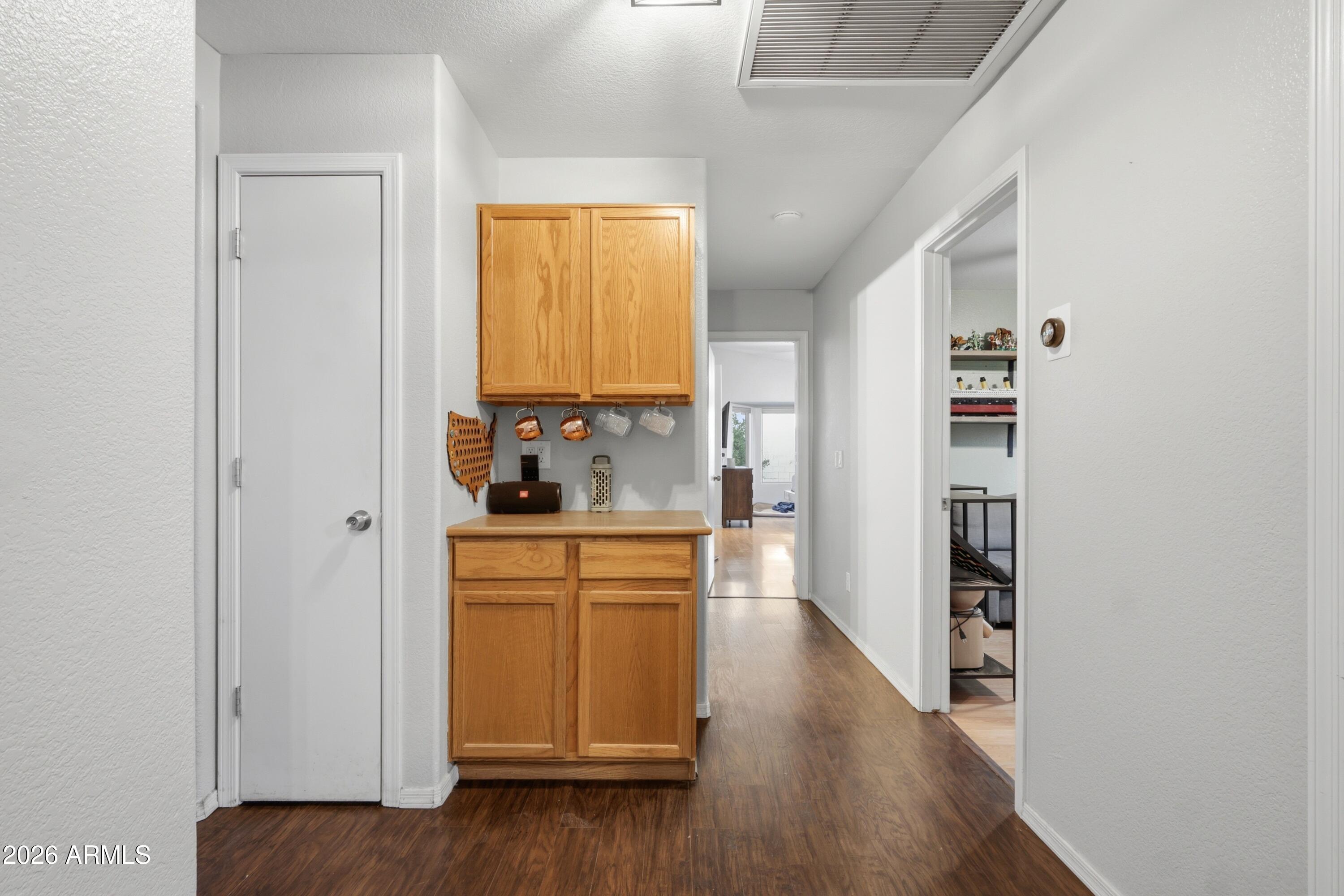 661 North Joshua Tree Lane Gilbert, AZ 85234 - Photo 26 of 47 a view of kitchen with wooden floor