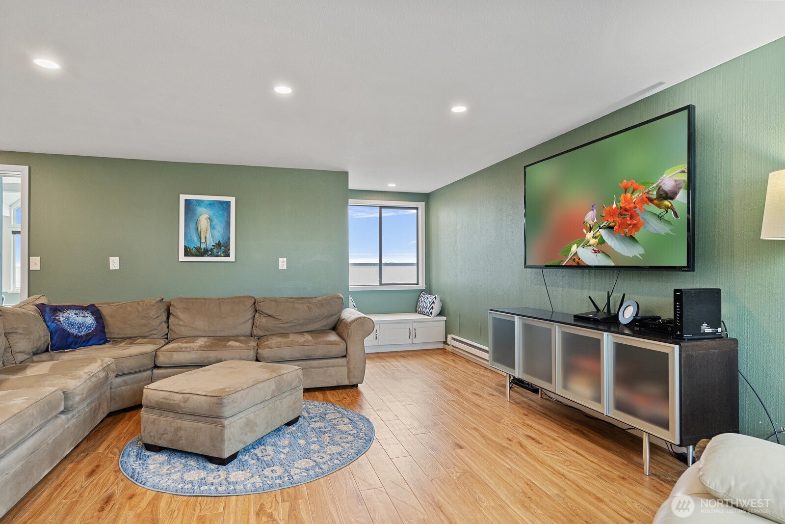 2508 Sunlight Beach Road Clinton, WA 98236 - Photo 13 of 33 a living room with furniture and a flat screen tv