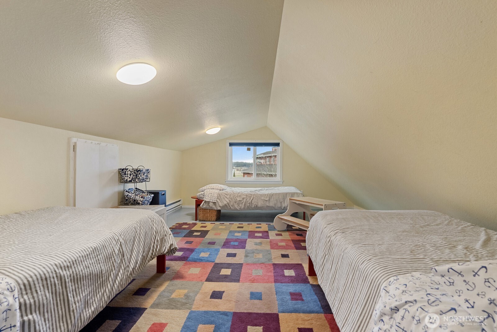 2508 Sunlight Beach Road Clinton, WA 98236 - Photo 15 of 33 a bedroom with double bed and a lamp