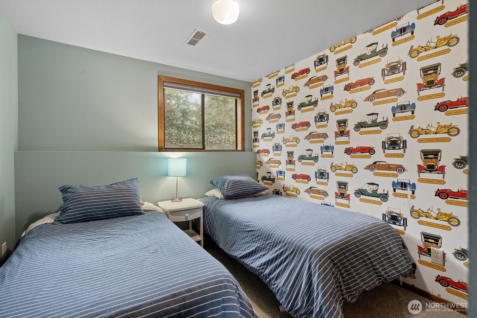 2508 Sunlight Beach Road Clinton, WA 98236 - Photo 22 of 33 a bedroom with a bed and a window