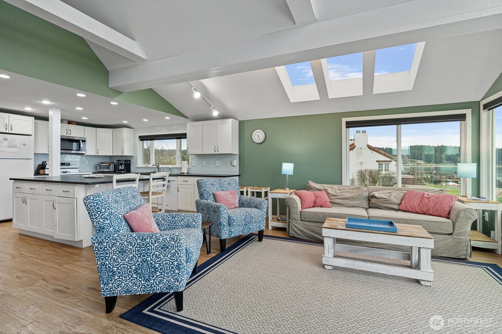 2508 Sunlight Beach Road Clinton, WA 98236 - Photo 5 of 33 a living room with furniture and a open kitchen view