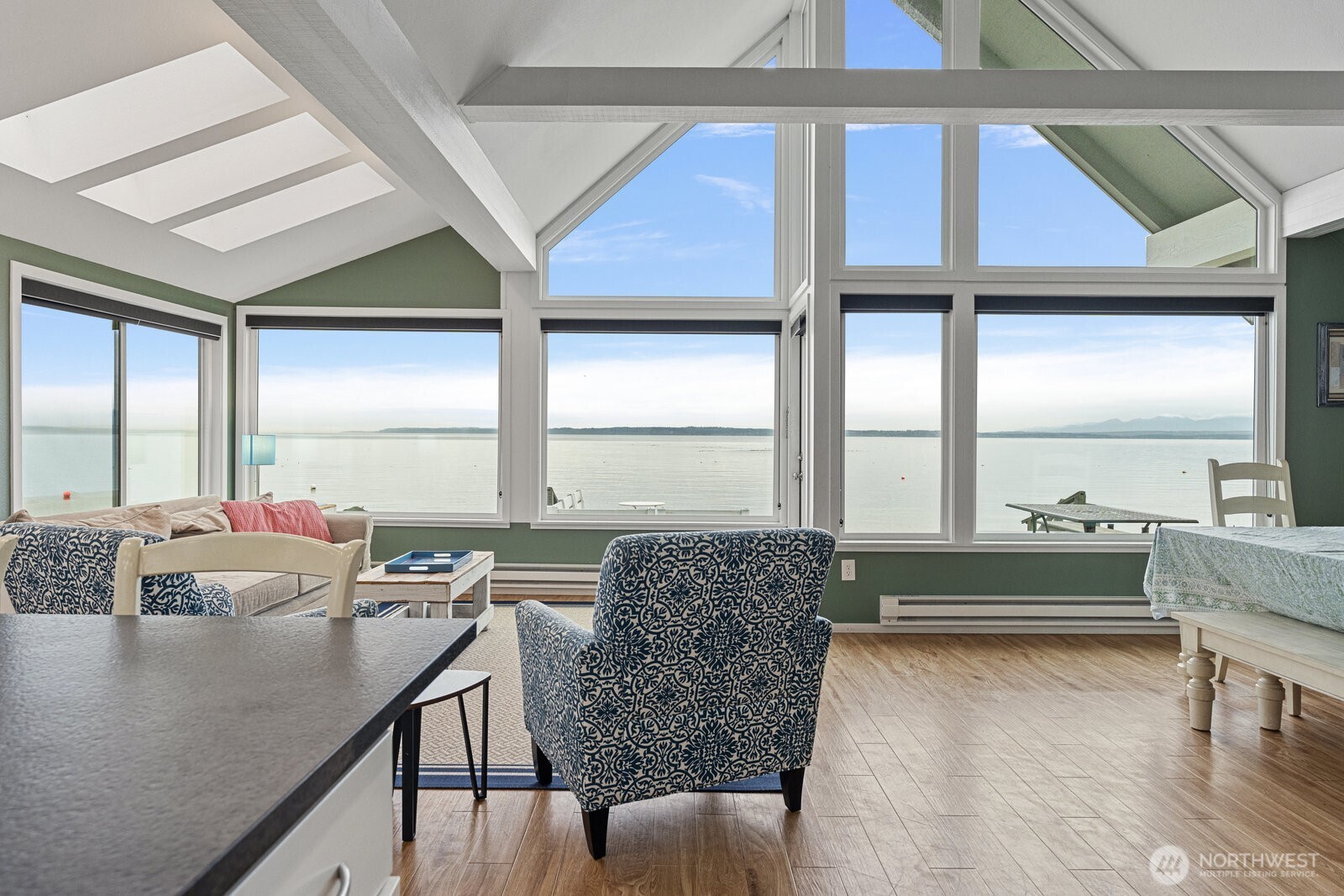 2508 Sunlight Beach Road Clinton, WA 98236 - Photo 9 of 33 a living room with furniture and large windows