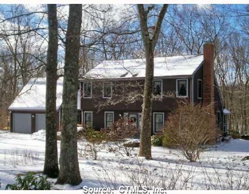 337 Clubhouse Road Lebanon, CT 06249 - Photo 1 of 1 a front view of a house with tree s
