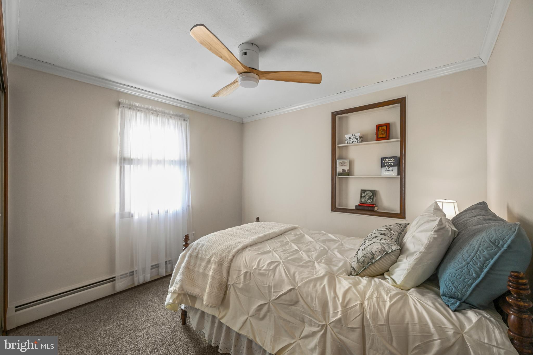 1027 Upton Road Glen Burnie, MD 21060 - Photo 12 of 39 a bedroom with a bed and a window