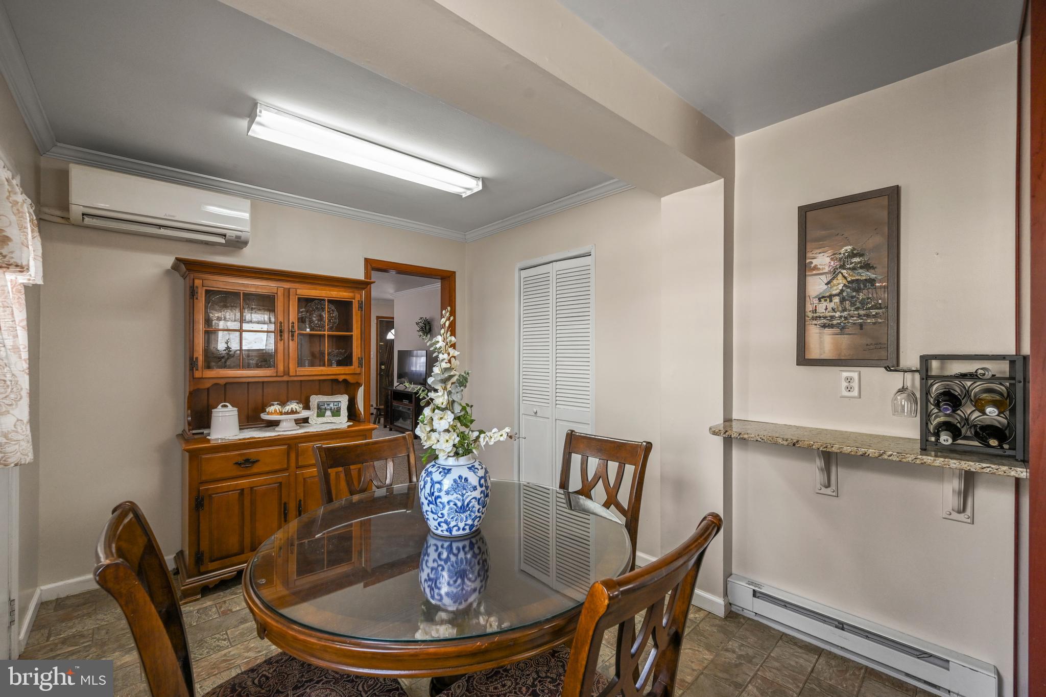 1027 Upton Road Glen Burnie, MD 21060 - Photo 16 of 39 a dining room with furniture and window