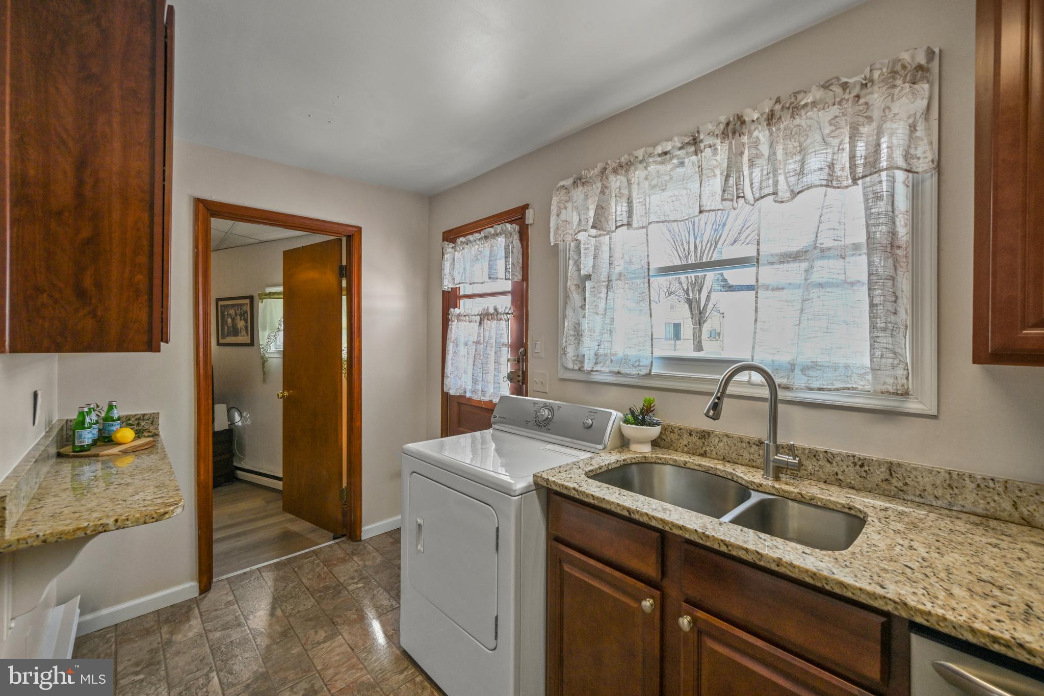 1027 Upton Road Glen Burnie, MD 21060 - Photo 24 of 39 a kitchen with a sink and cabinets