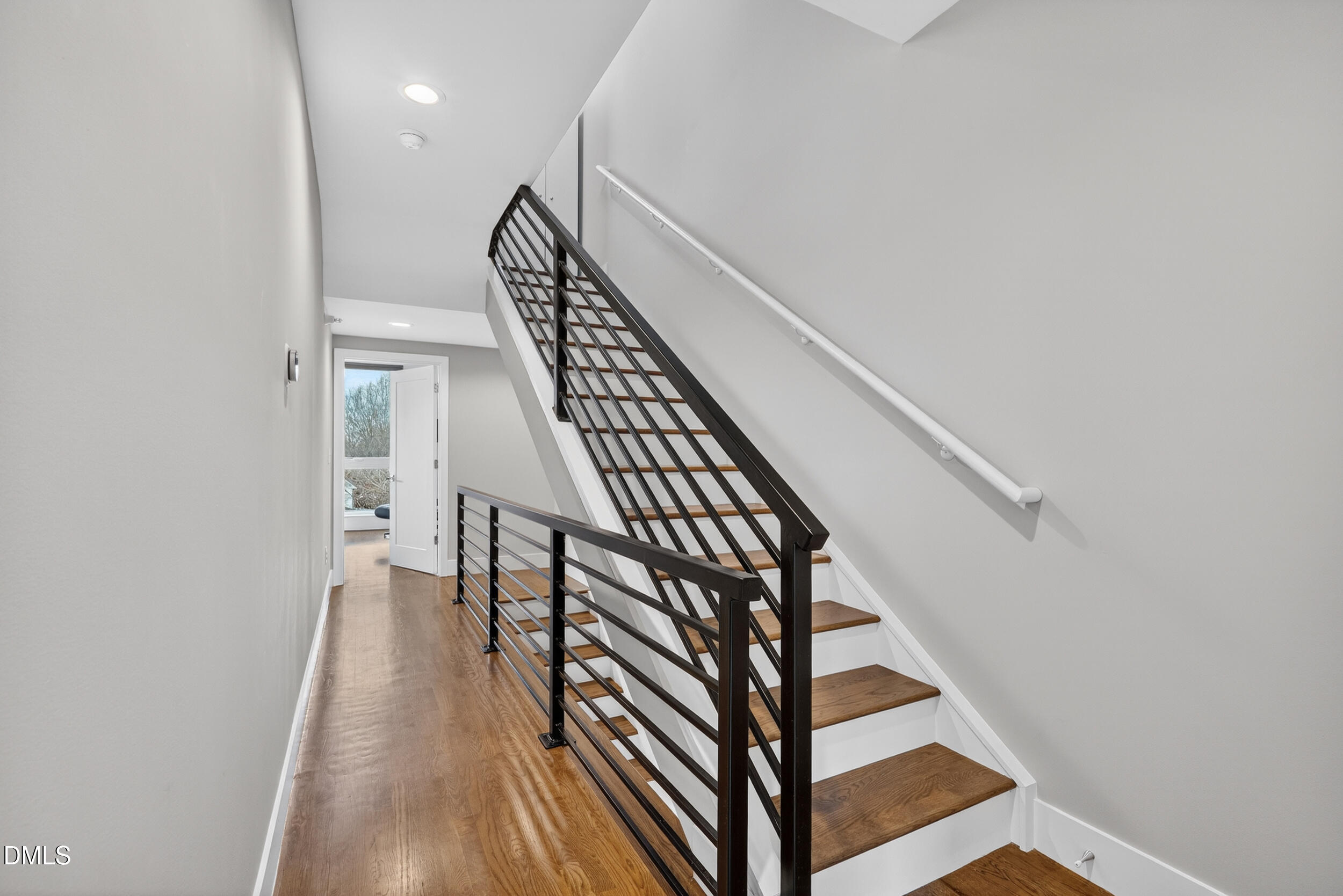 537 New Bern Avenue, Unit 101 Raleigh, NC 27601 - Photo 13 of 34 a view of entryway with wooden floor
