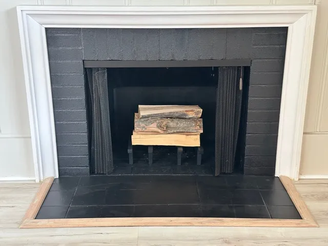 a living room with a fireplace