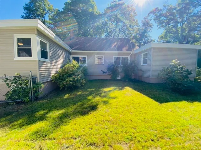 a view of a house with a swimming pool