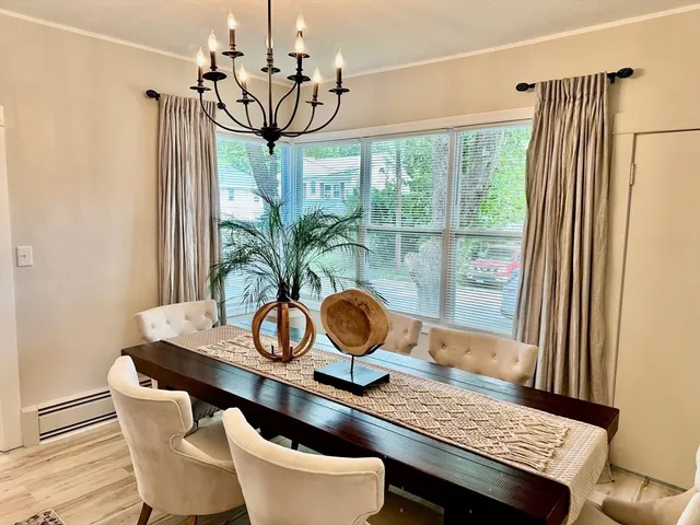 a table room with a table and chairs