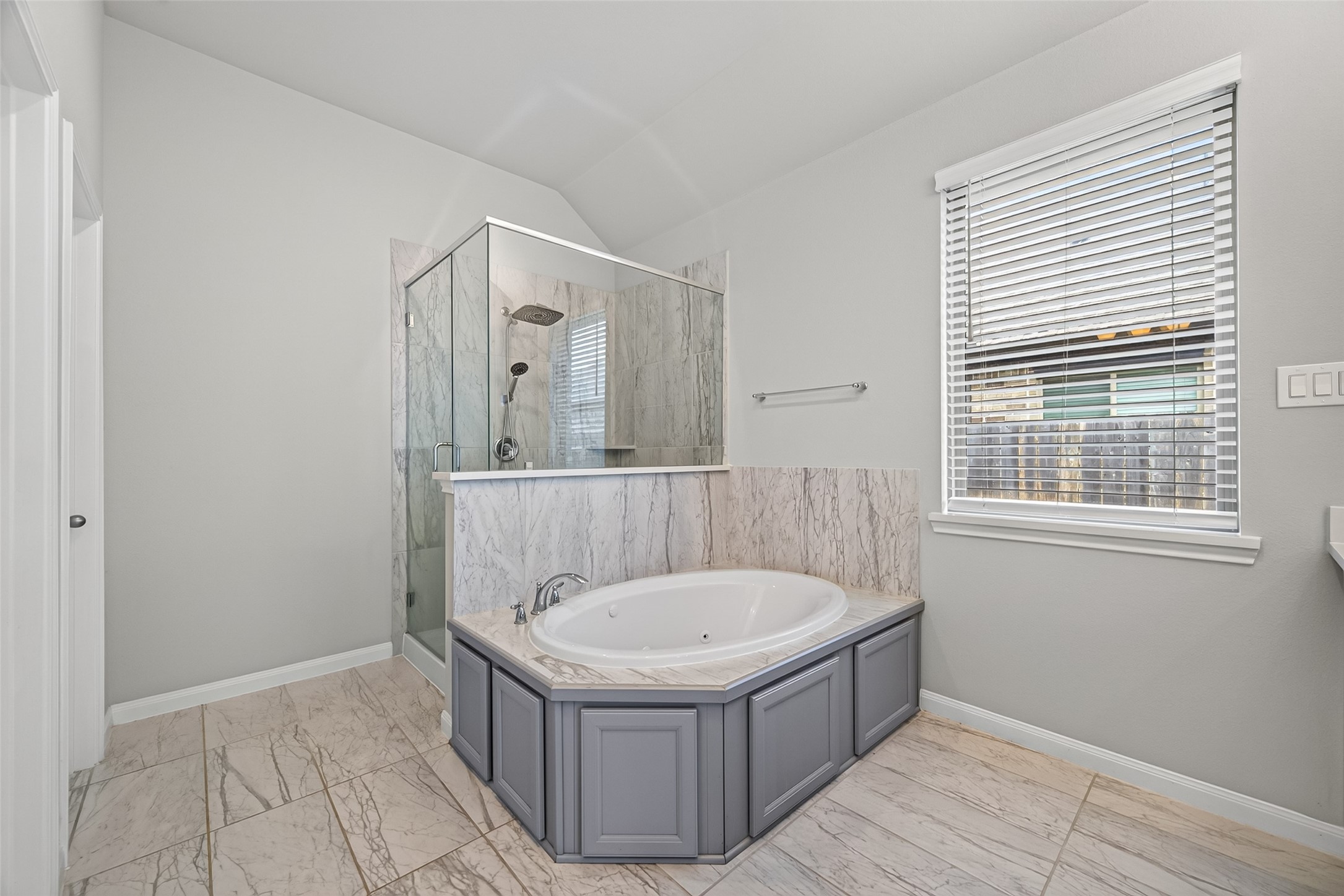 17323 Grand Canyon Road Conroe, TX 77302 - Photo 19 of 40 Deep soaking tub and glass-walled separate shower.