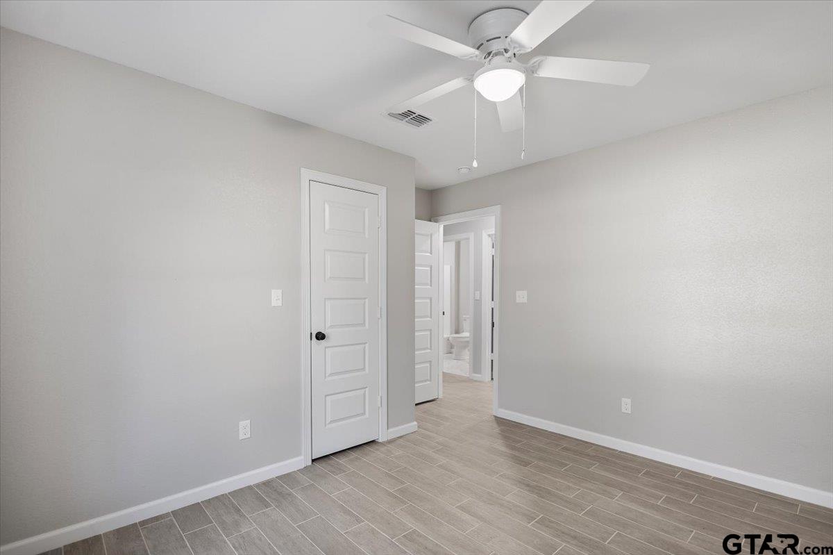 234 Sabinal Street Bullard, TX 75757 - Photo 17 of 30 wooden floor in an empty room