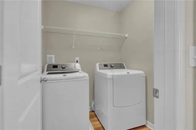 a utility room with dryer and washer