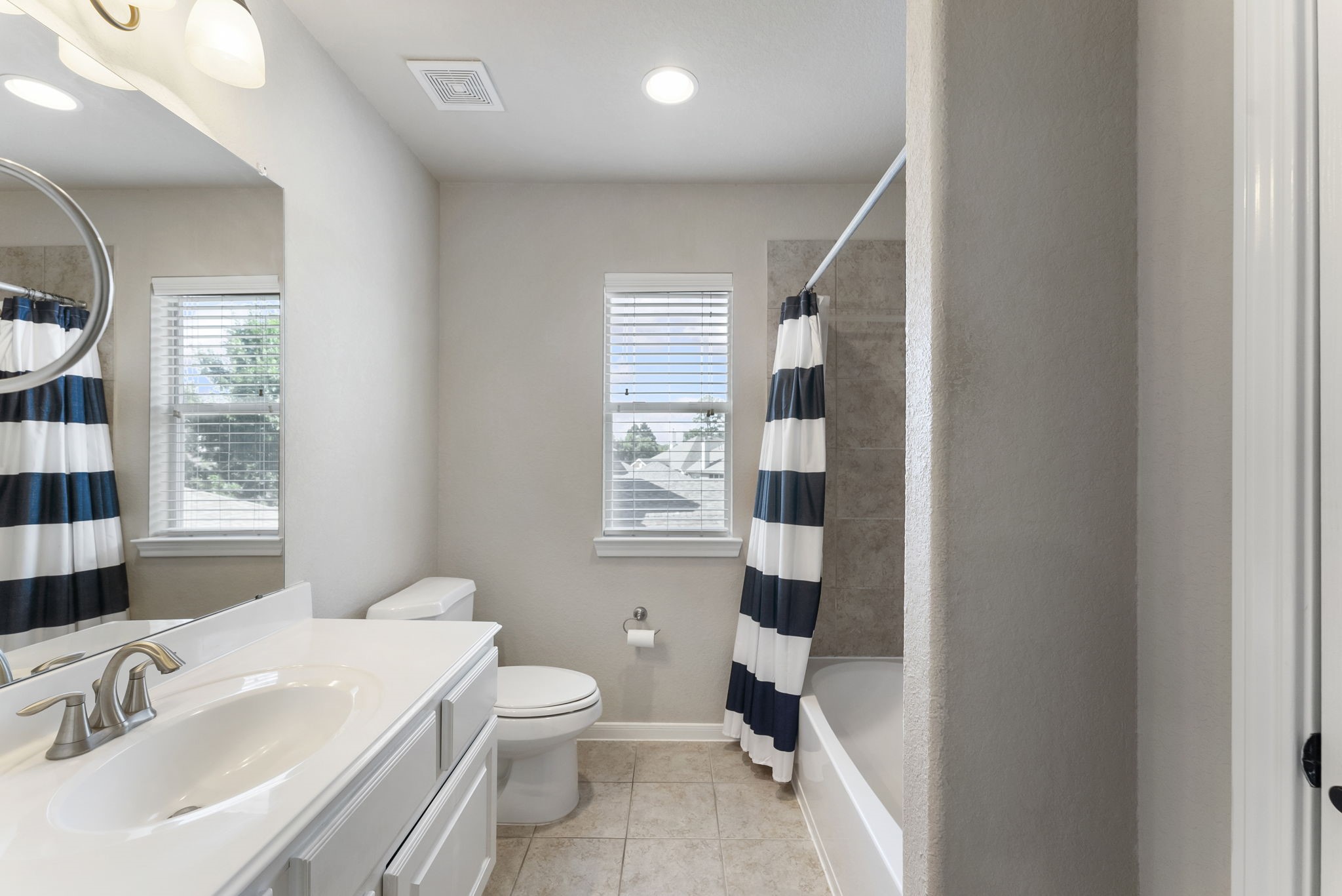 19223 Senterra Lakes Boulevard Spring, TX 77379 - Photo 33 of 48 a bathroom with a sink toilet tub and shower