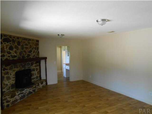 2089 Brownsdale Loop Road Jay, FL 32565 - Photo 8 of 8 Den w/ fireplace