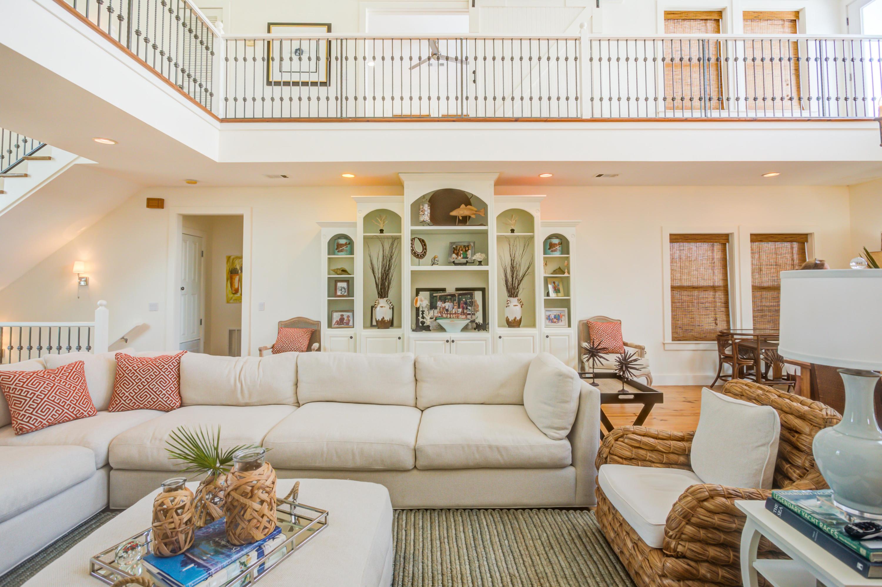 523 Gulf Shore Drive Destin, FL 32541 - Photo 16 of 78 a living room with furniture a rug and a window