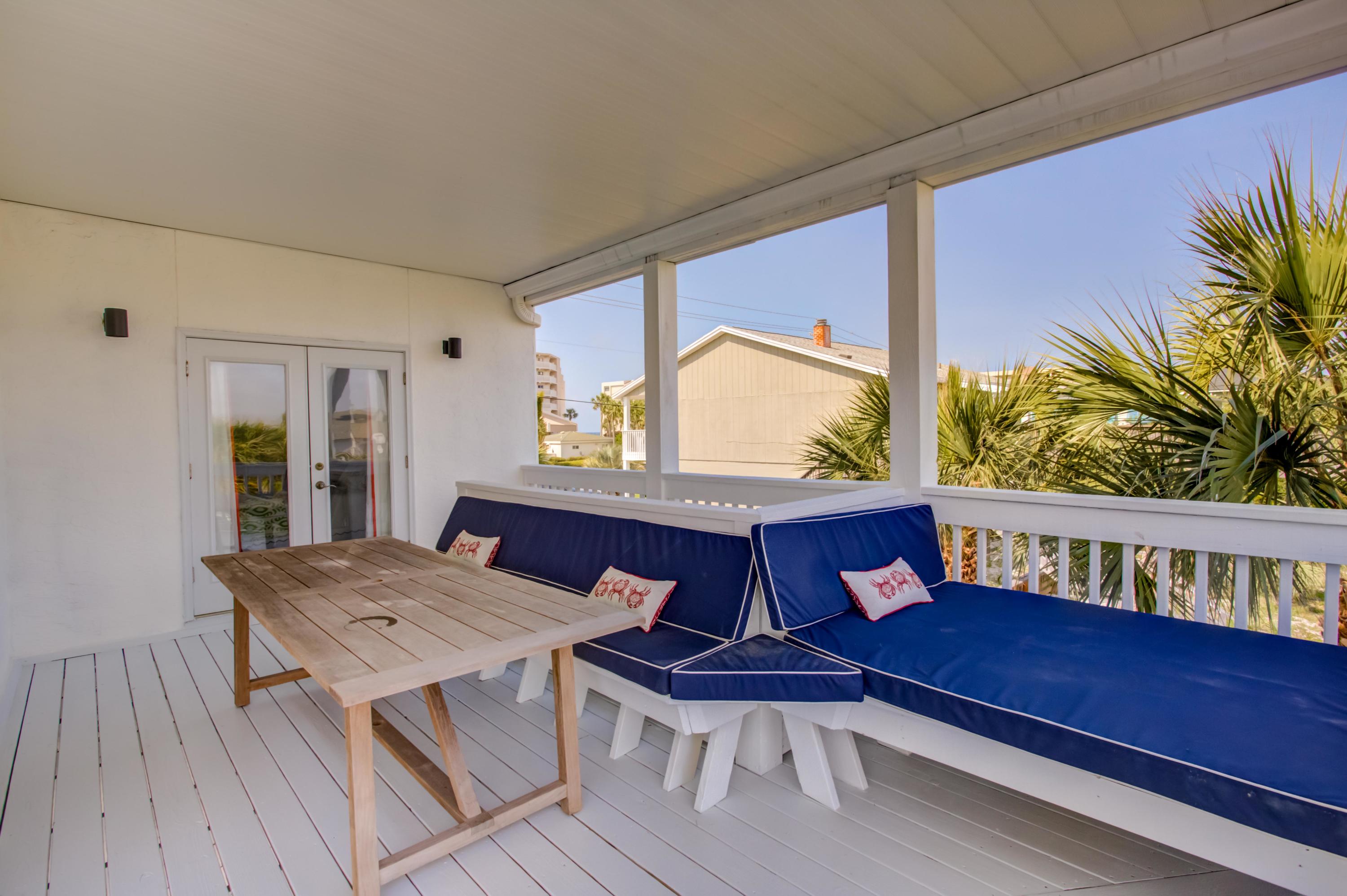523 Gulf Shore Drive Destin, FL 32541 - Photo 39 of 78 a view of a dining room with furniture window and wooden floor