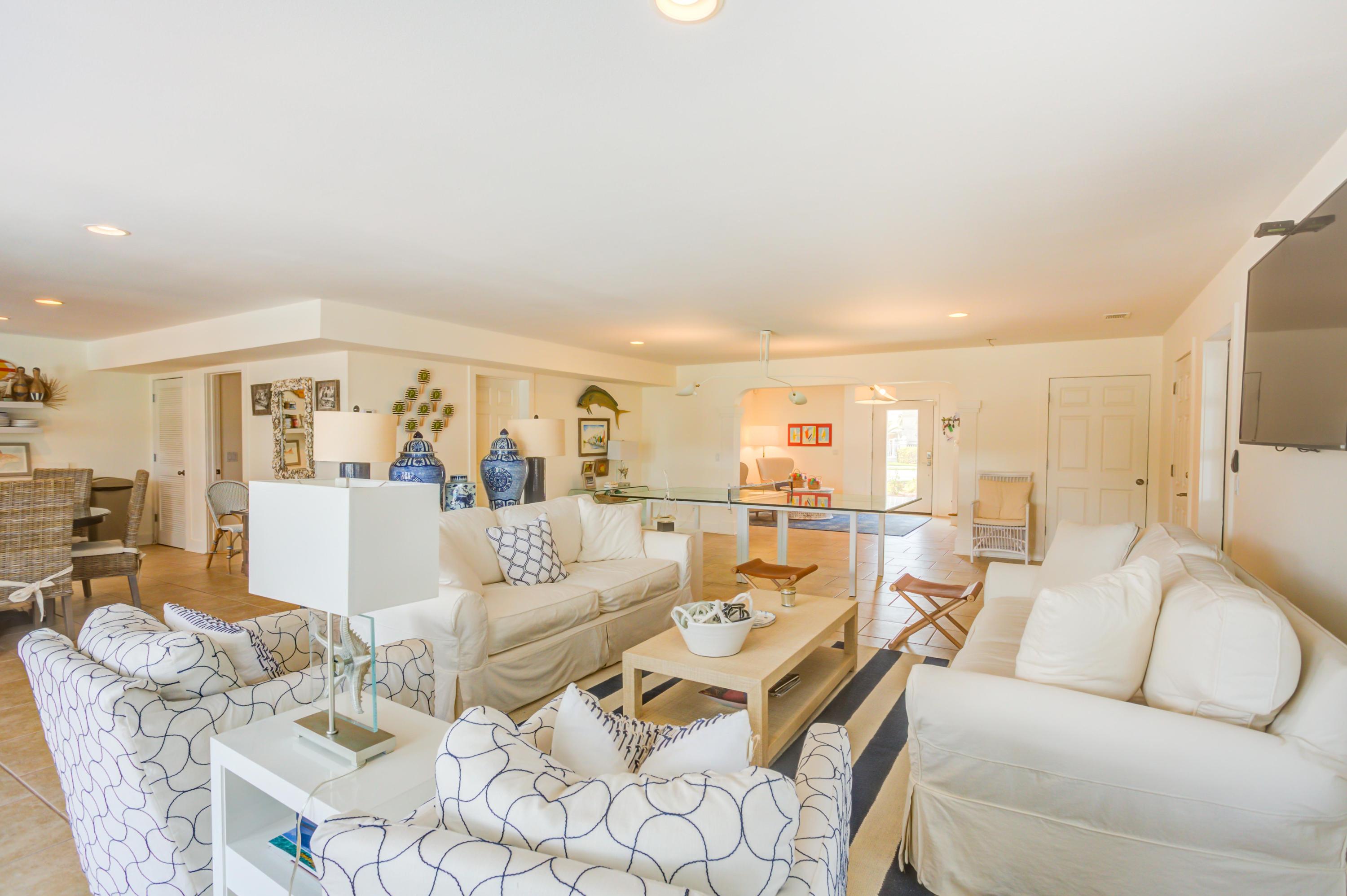523 Gulf Shore Drive Destin, FL 32541 - Photo 50 of 78 a living room with furniture and a large window