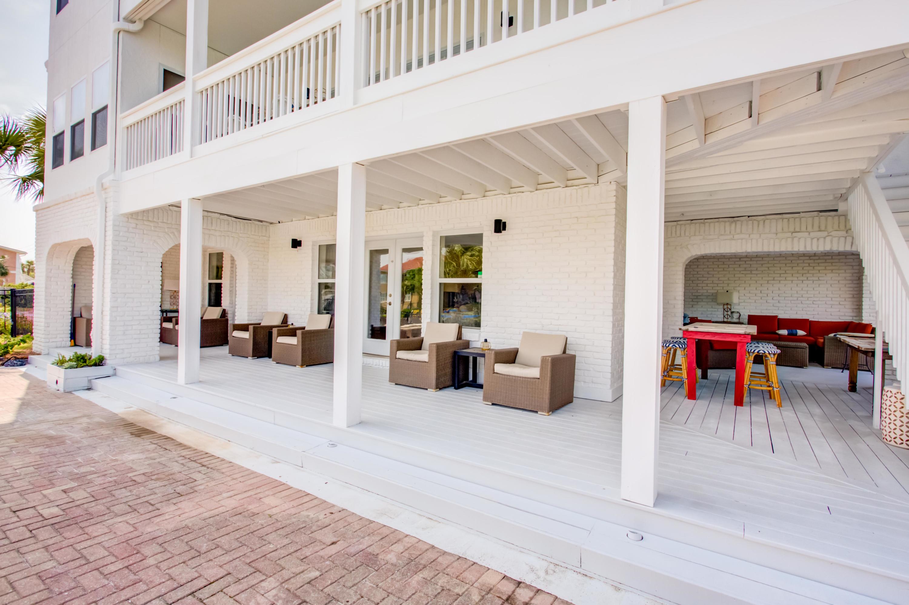 523 Gulf Shore Drive Destin, FL 32541 - Photo 59 of 78 a living room with furniture and a wooden floor