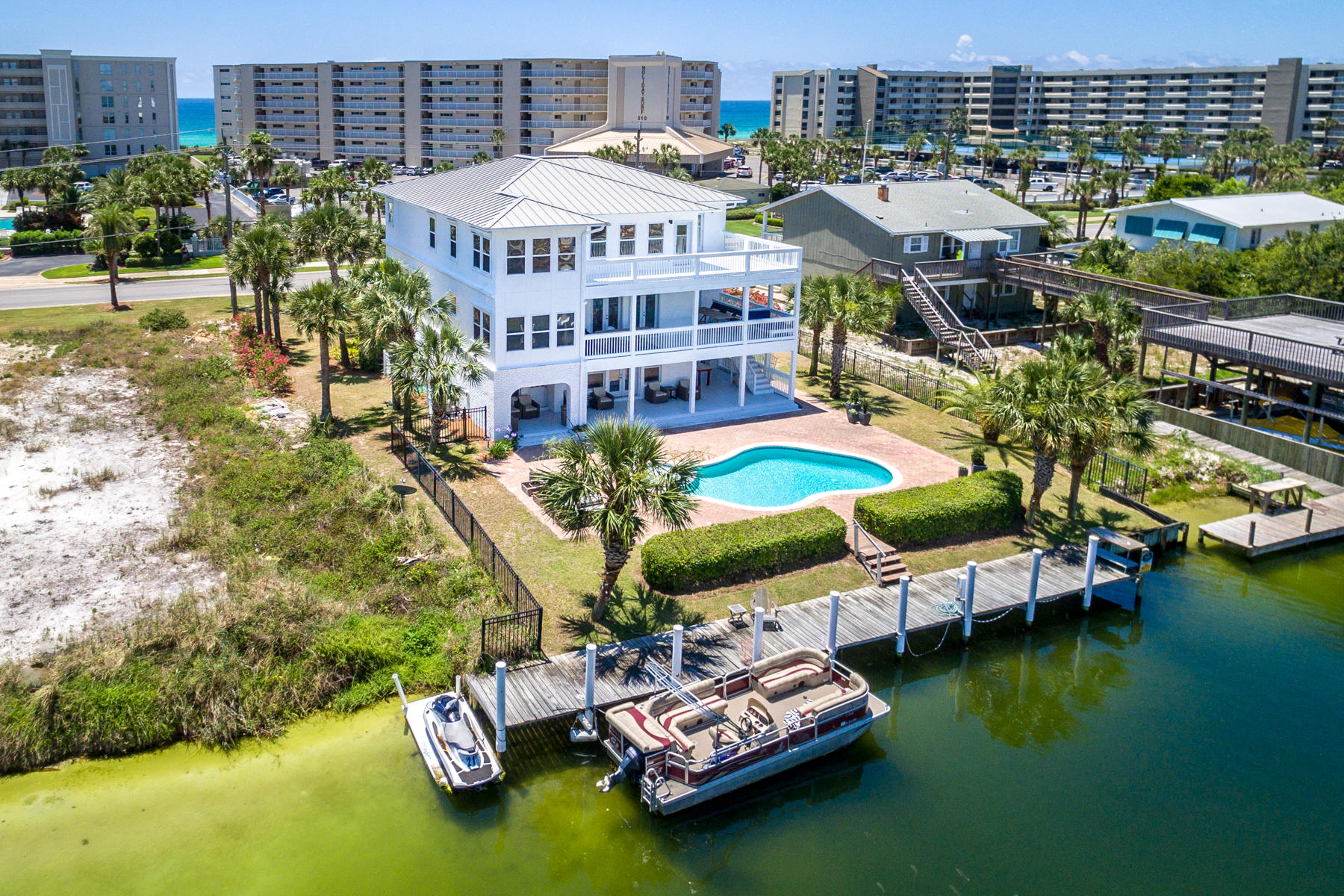 523 Gulf Shore Drive Destin, FL 32541 - Photo 72 of 78 an aerial view of a house with a swimming pool patio and outdoor seating