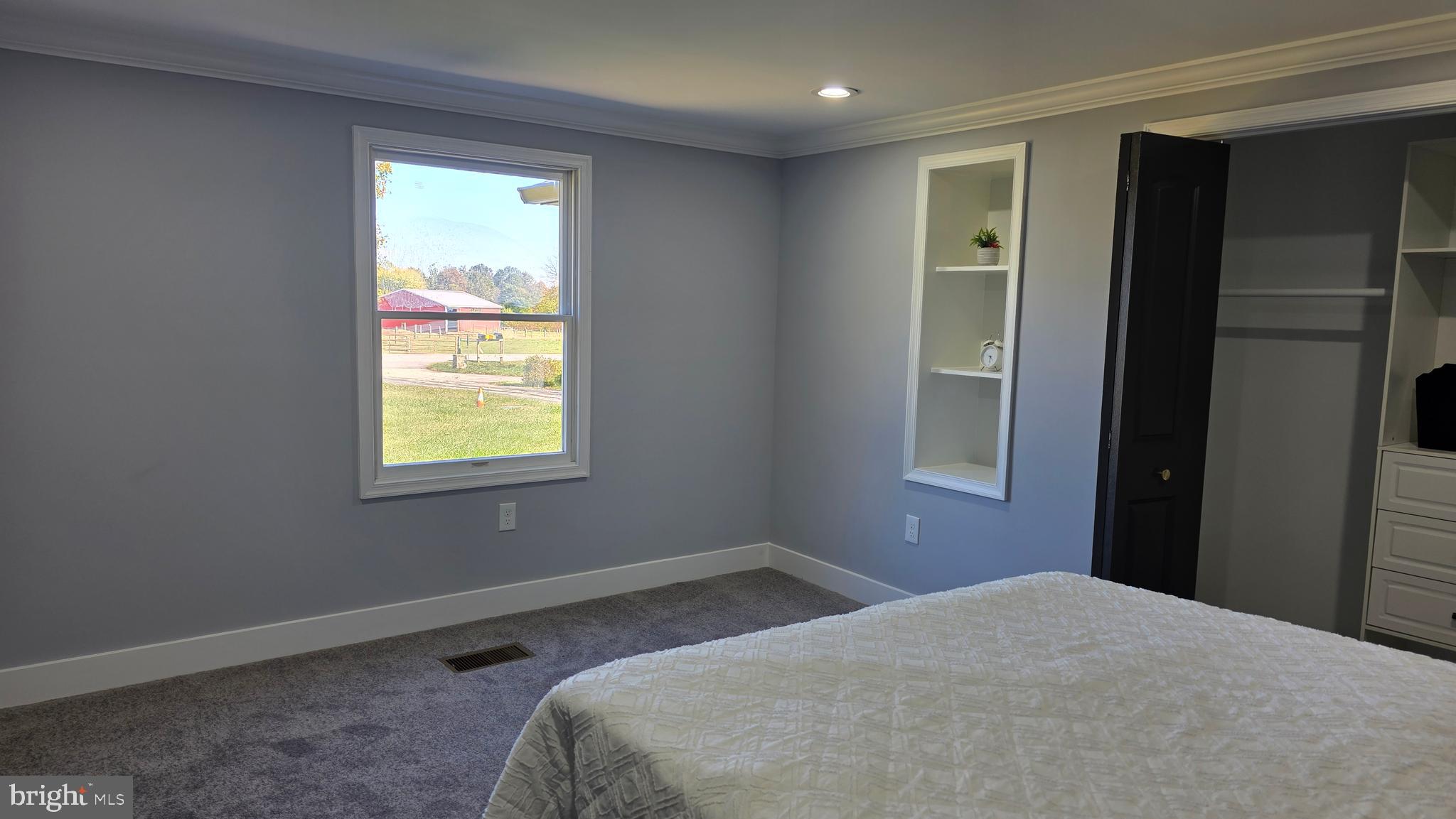 4010 Fringer Road Taneytown, MD 21787 - Photo 25 of 54 a bedroom with a bed and a window