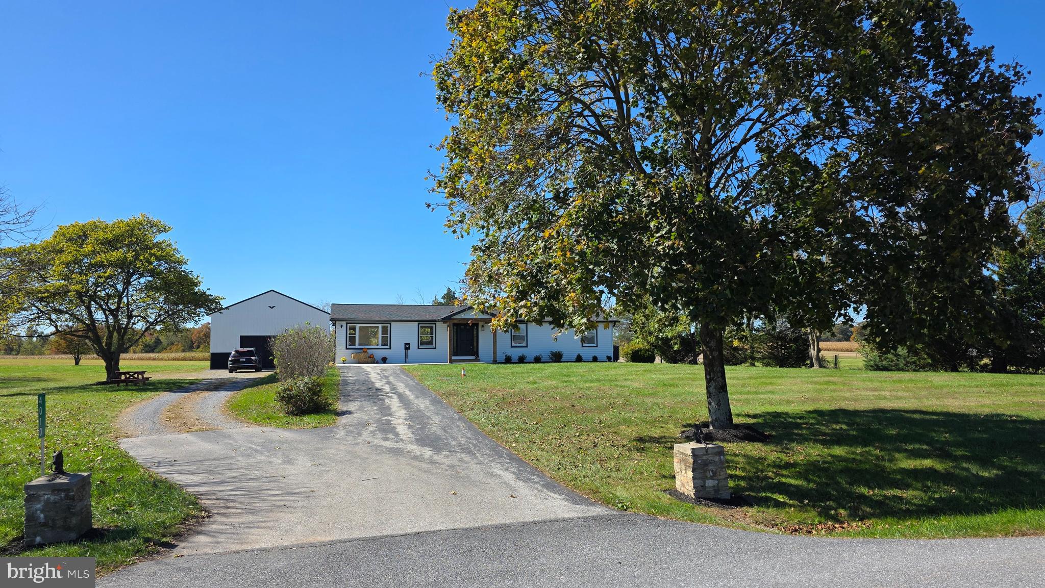 4010 Fringer Road Taneytown, MD 21787 - Photo 3 of 54 a front view of a house with a yard