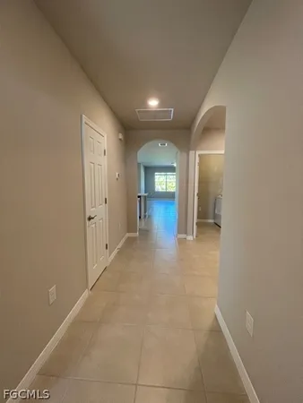 a view of hallway with livingroom