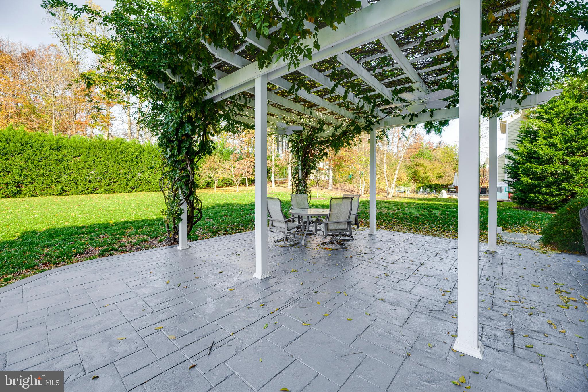 11104 Park Ridge Road Fredericksburg, VA 22408 - Photo 11 of 76 Stamped brick patio with Pergola with electric