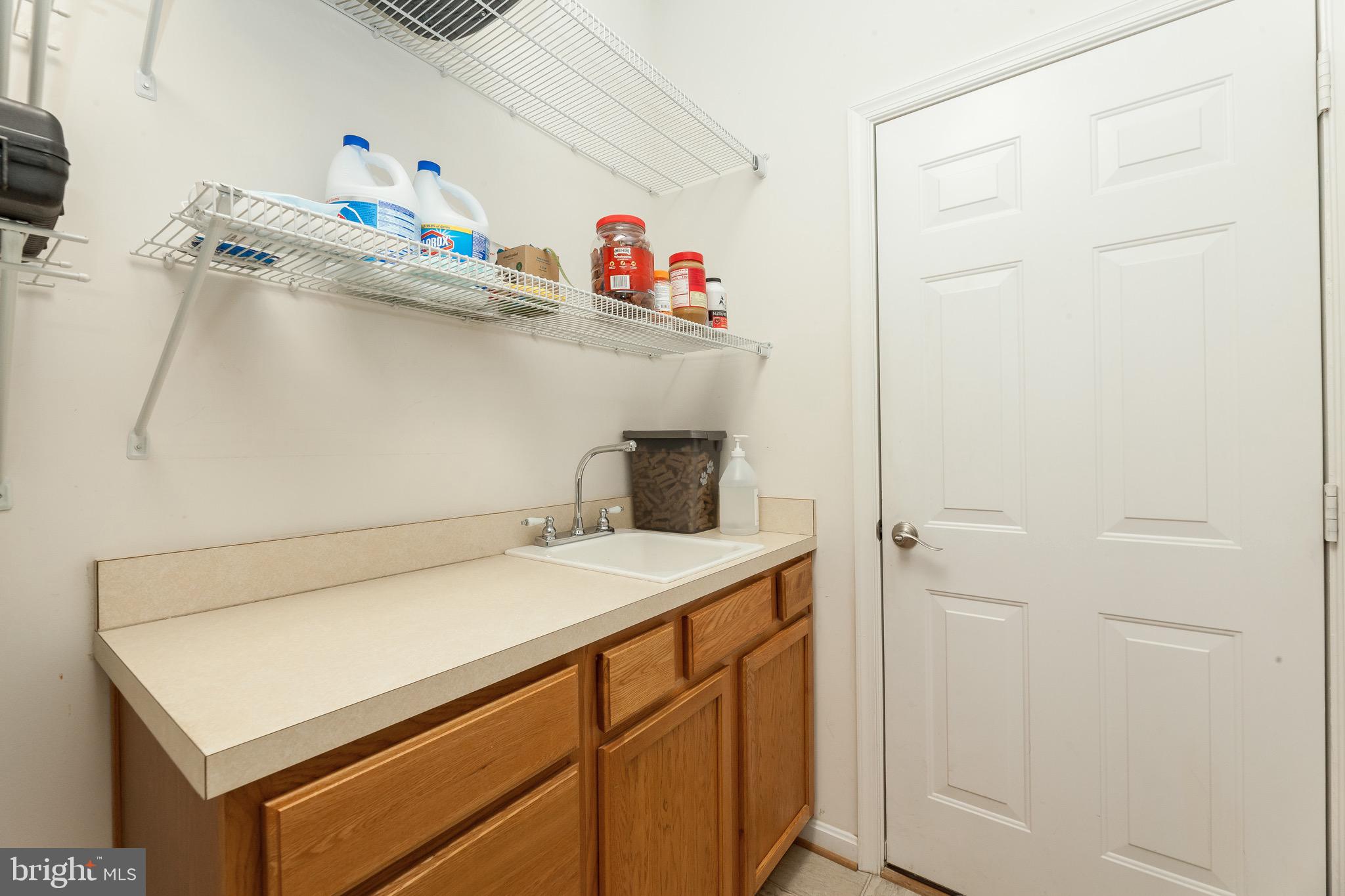 11104 Park Ridge Road Fredericksburg, VA 22408 - Photo 30 of 76 Huge laundry rm main lvl w/ storage & fold table