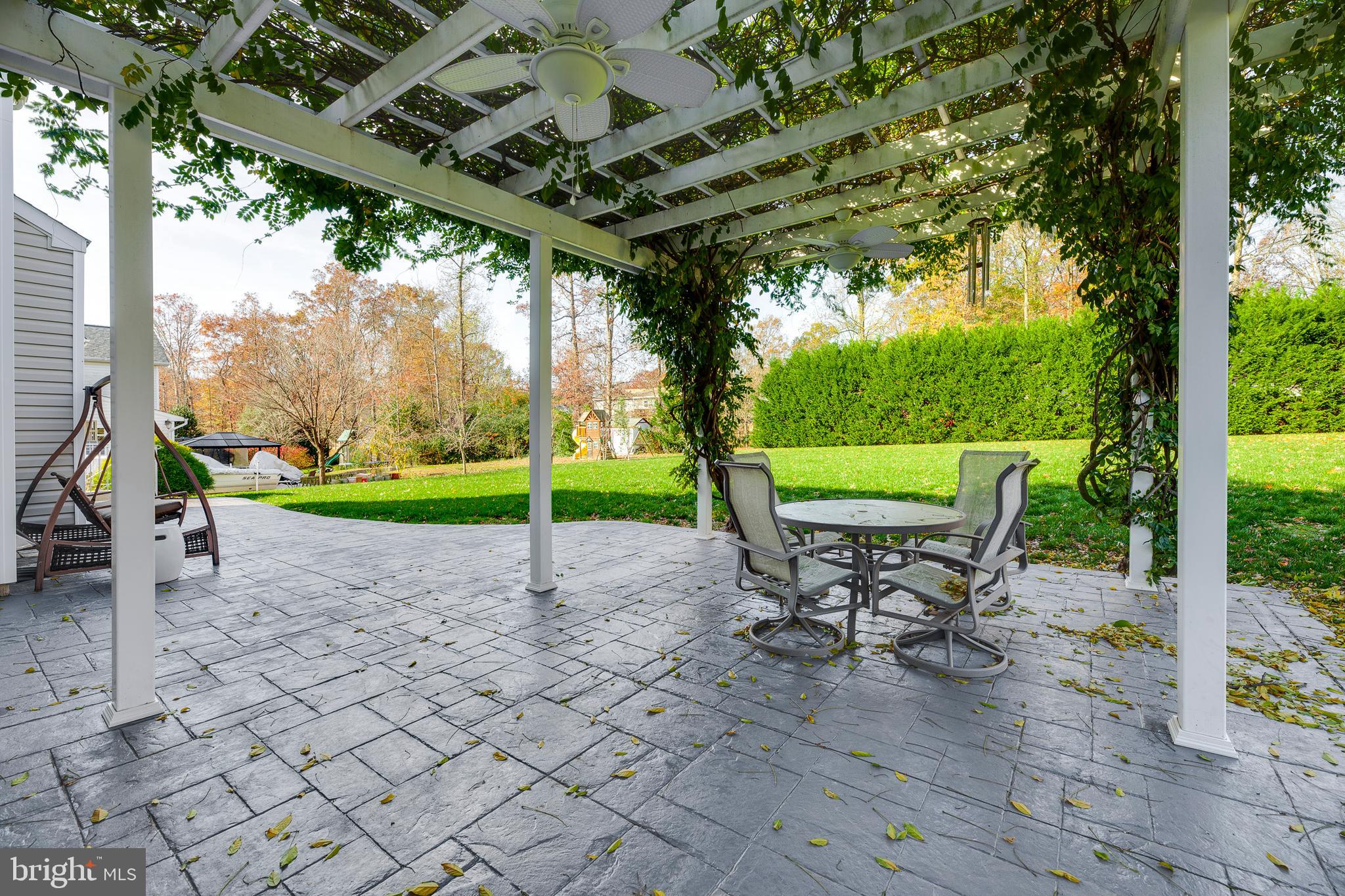 11104 Park Ridge Road Fredericksburg, VA 22408 - Photo 10 of 76 Stamped brick patio with Pergola with electric