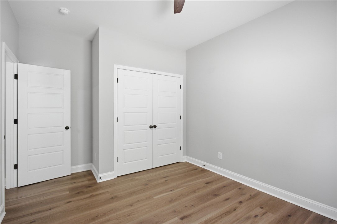 912 Watercrest Road West Union, SC 29696 - Photo 25 of 49 This spacious room features elegant flooring and convenient closet space.