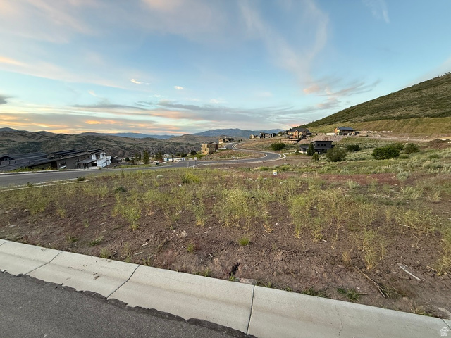 3923 East Harris Way Heber City, UT 84036 - Photo 7 of 12 Expansive land parcel featuring existing hillside development and paved roads
