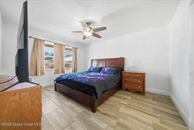 a bathroom with a double vanity sink and mirror