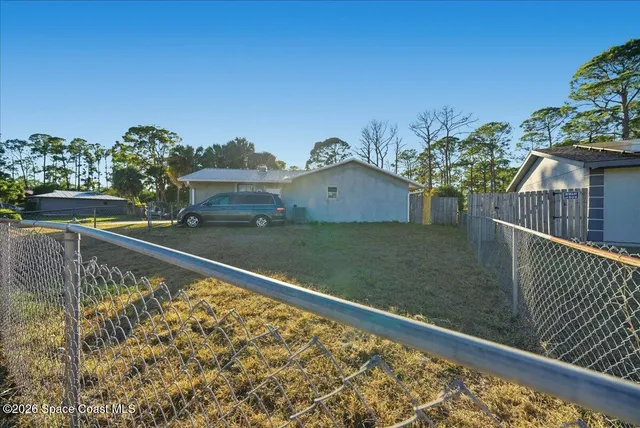 a view of swimming pool from a balcony