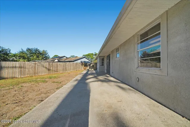 a view of a house with a ocean view