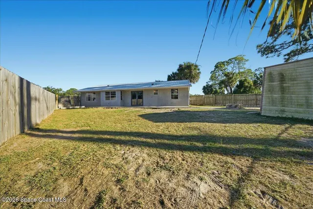 a view of swimming pool yard and lake view