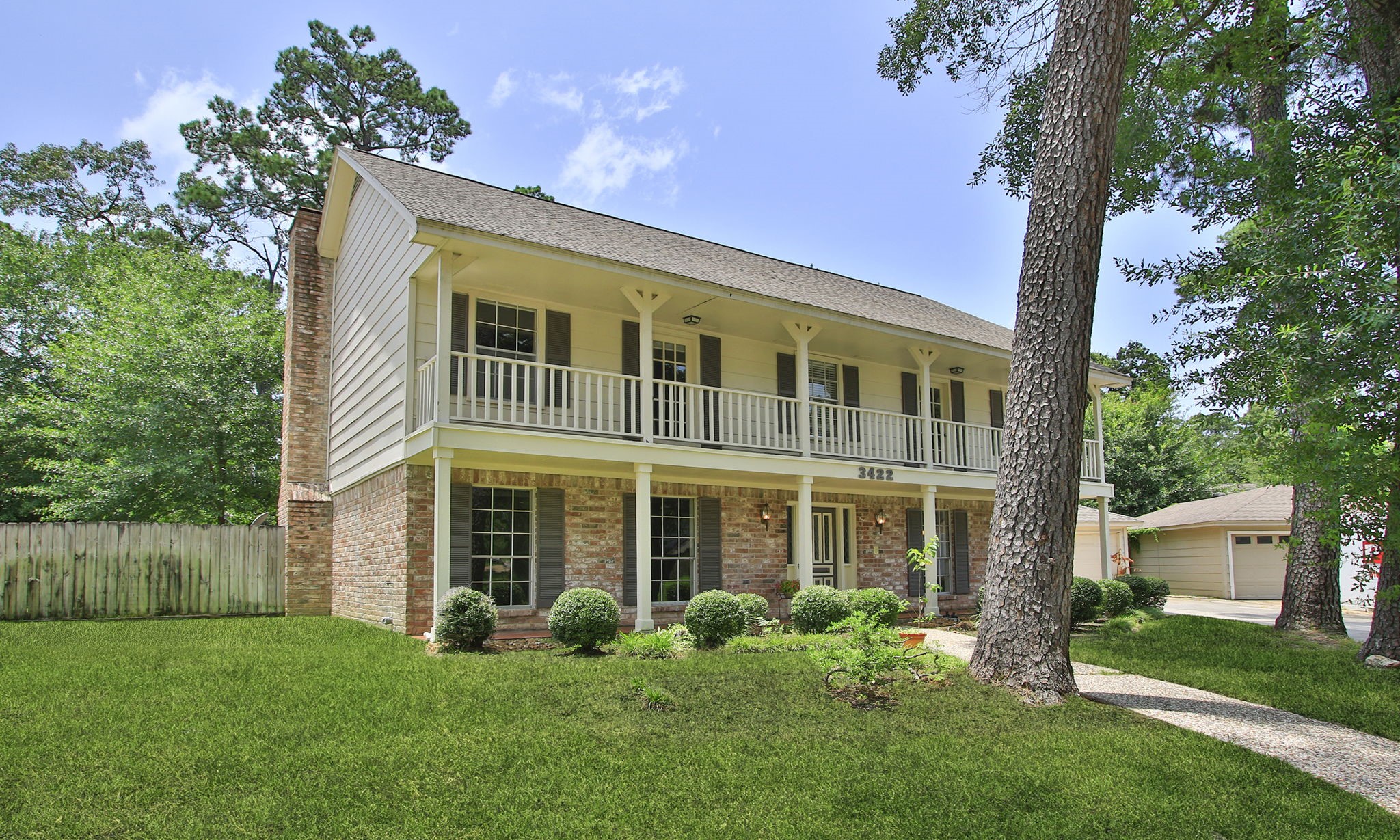 3422 Candlewisp Drive Spring, TX 77388 - Photo 2 of 50 Upstairs balcony spans the entire width of the home. Two of the upstairs bedrooms have direct access to the balcony.