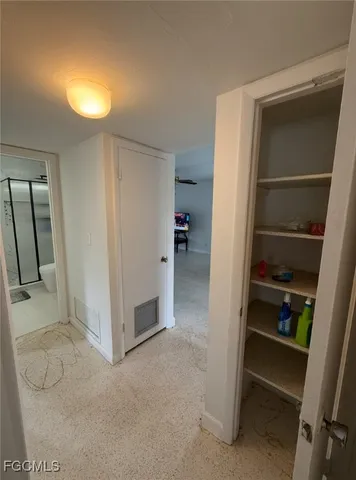 a view of kitchen and utility room