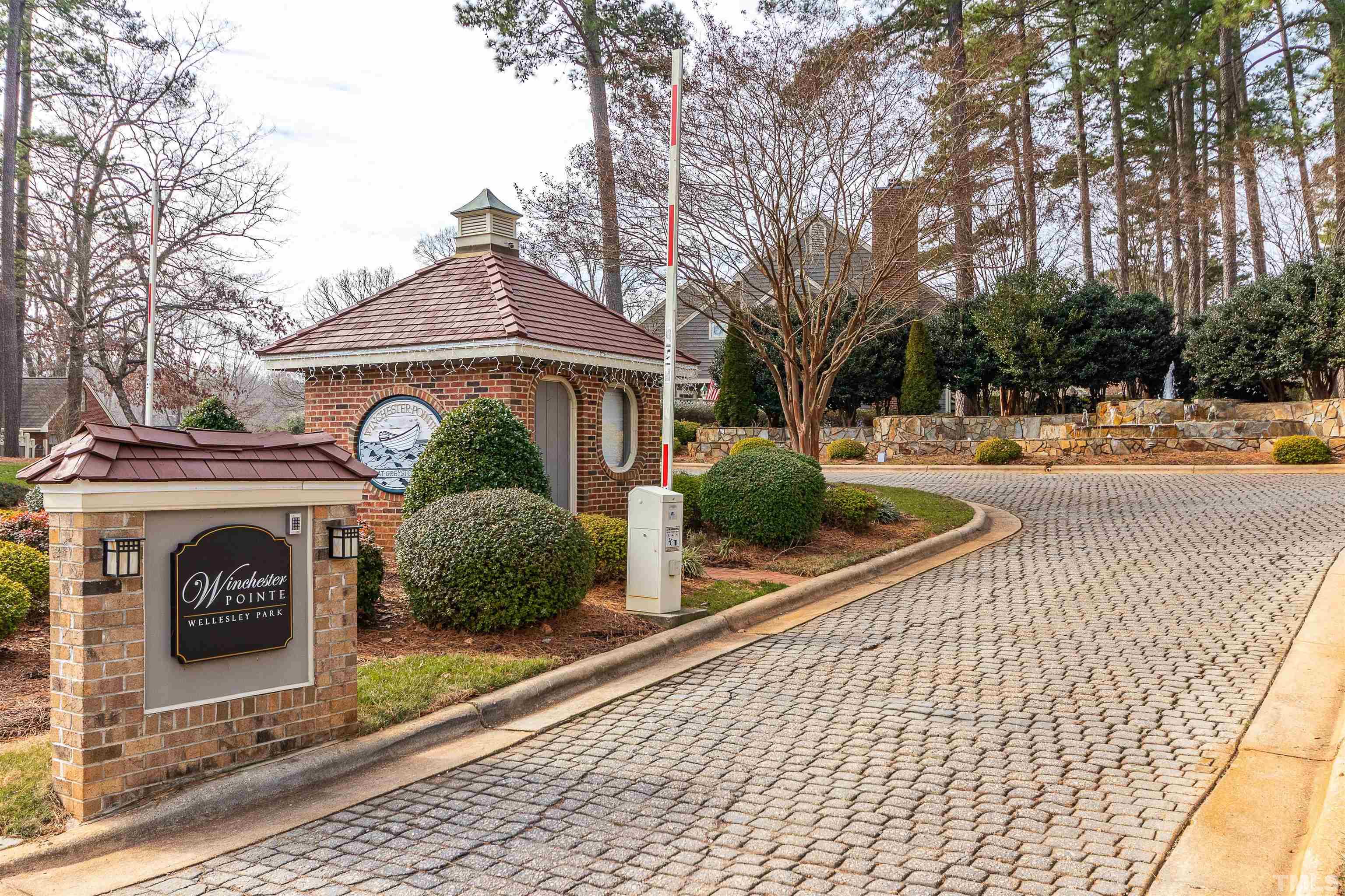 7631 Wellesley Park North Raleigh, NC 27615 - Photo 80 of 88 a front view of a house with a yard