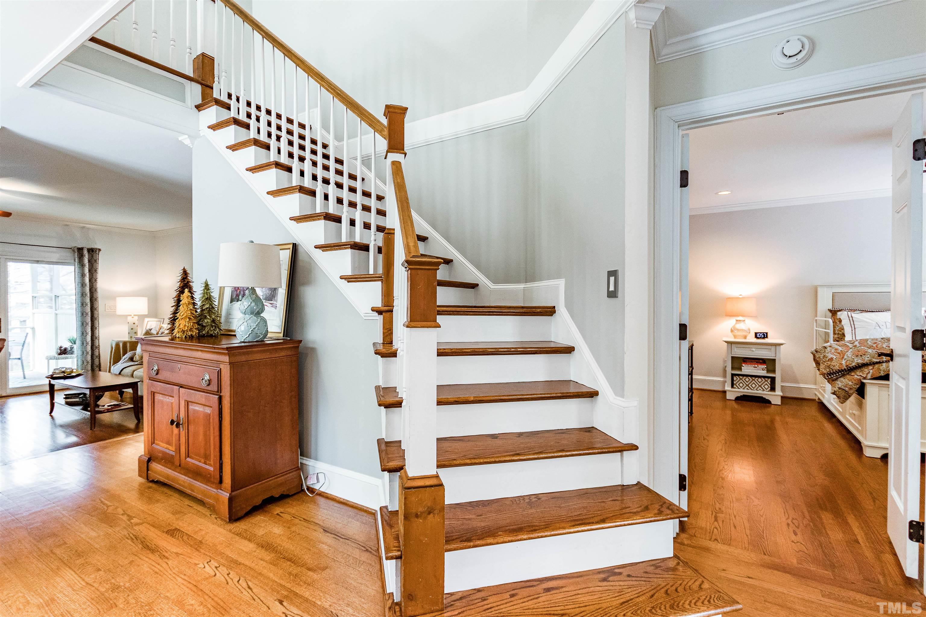 7631 Wellesley Park North Raleigh, NC 27615 - Photo 10 of 88 a view of entryway and hall with wooden floor
