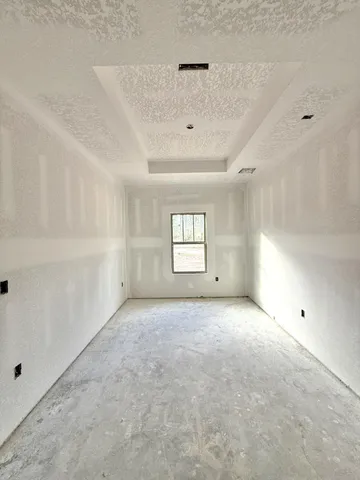 a bathroom with a granite countertop sink mirror and a