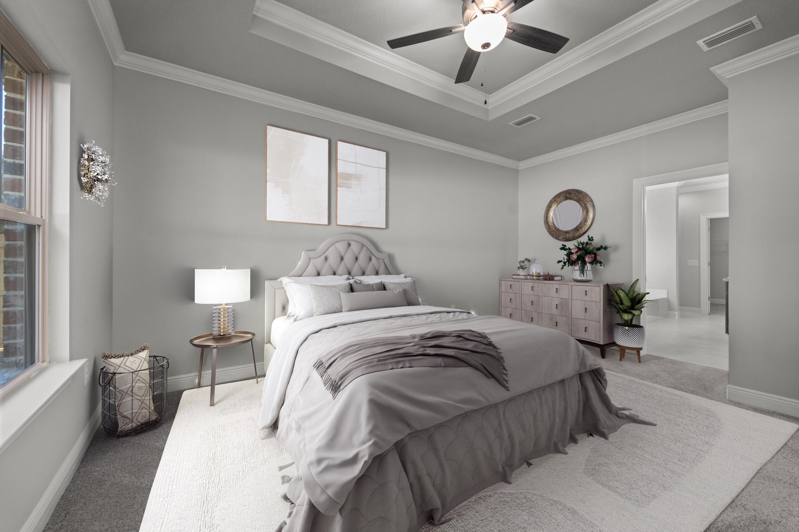 6699 Rocky Shores Road Milton, FL 32583 - Photo 35 of 77 a bedroom with a bed and a chandelier