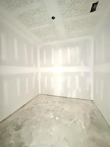 a view of a porch with wooden floor