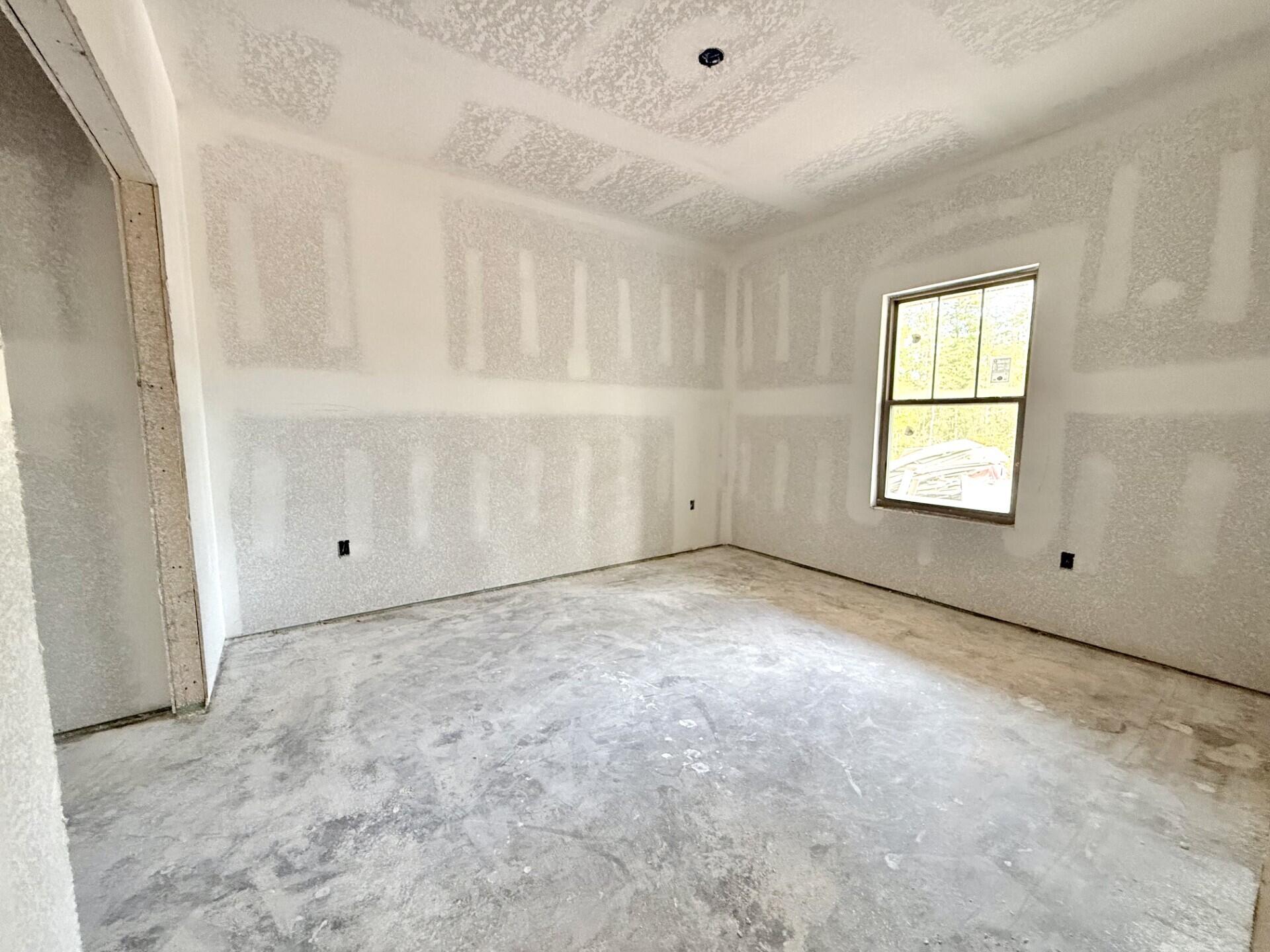 6699 Rocky Shores Road Milton, FL 32583 - Photo 49 of 77 an empty room with windows